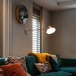 Design-vegglampe-rosa-justerbar---Triangolo