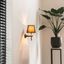 Moderne-wandlamp-zwart-incl.-kap-met-gouden-binnenkant---Pluk