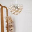 Art-Deco-viseća-lampa-crna-sa-jantarnim-staklom-8-lampi---Uvas