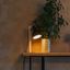 Ruralna-stolna-lampa-crna-sa-drvetom---kremen