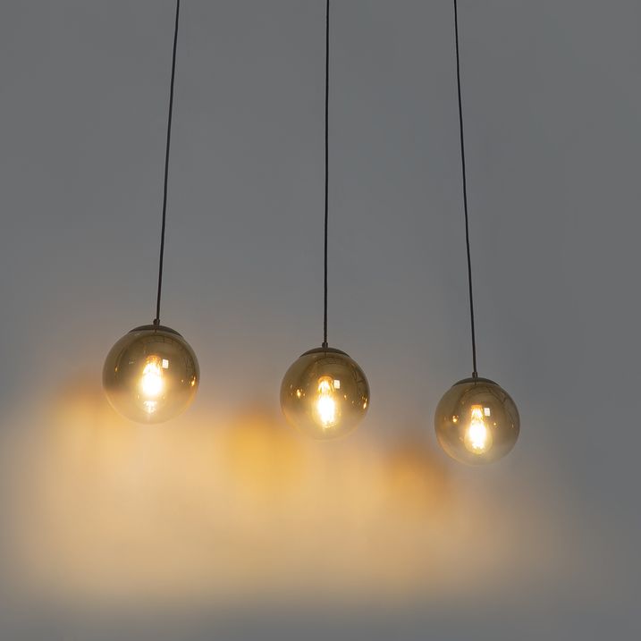 Art Deco Hängeleuchte schwarz mit goldfarbenem Glas länglich 3-flammig - Pallon