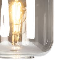 Design-Stehleuchte-schwarz-mit-Gold-und-Rauchglas-–-Zuzanna