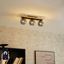 Plafoniera-smart-nera-con-legno-e-vetro-fumé-3-luci-incl.-WiFi-A60---Aleks