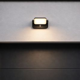 Vonkajšia nástenná lampa čierna vrátane LED nastaviteľná s pohybovým senzorom - Kamile